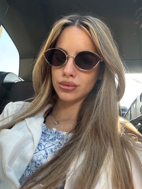 Woman in sunglasses observed in vehicle in Strumyani, Bulgaria
