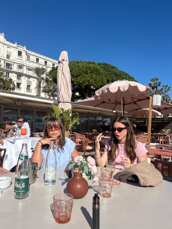 Woman photographed dining at seaside restaurant in Cannes