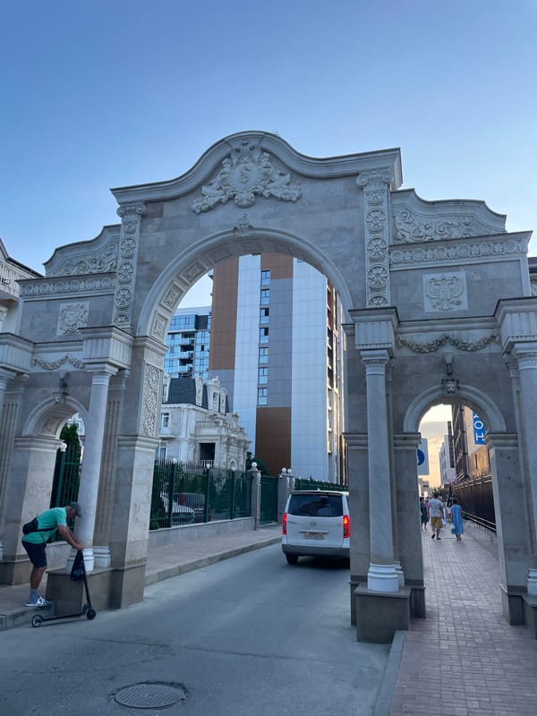 Anapa's Victory Arch and summer resort scene, July afternoon