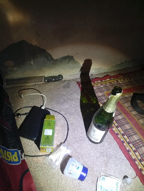 Objects scattered on floor documented in Rigasa home