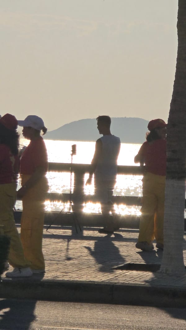 Group performs coordinated beach dance in Nha Trang, Vietnam