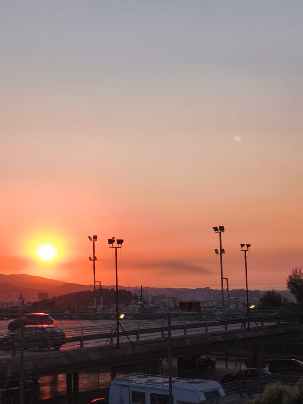 Barcelona sunset, street level, warm golden hour light