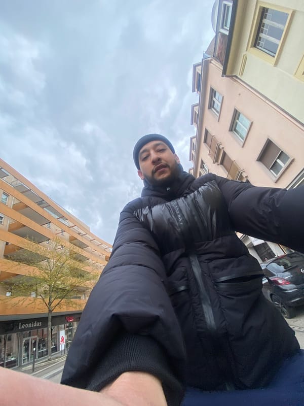 Man photographed on overcast street in Schiltigheim, France