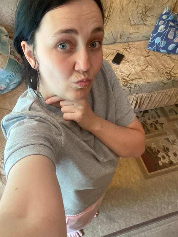 Relaxed indoor selfie session on the sofa