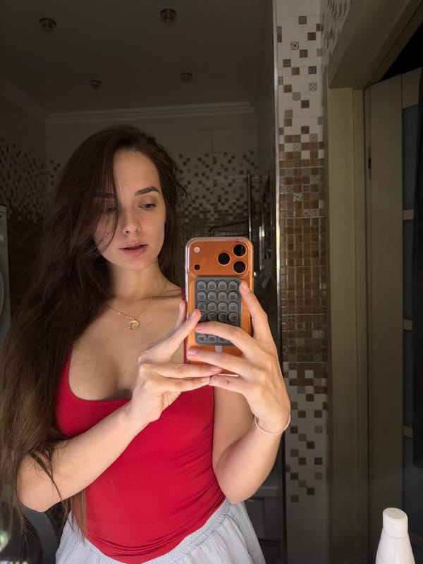 Bathroom selfies in Ufa, same moment, same spot