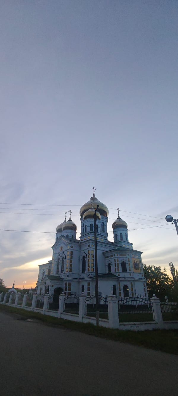 Orthodox cathedral with golden domes photographed in Novodonetskaya, Russia