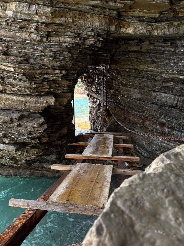 Cave interior with wooden walkway documented in Budva, Montenegro