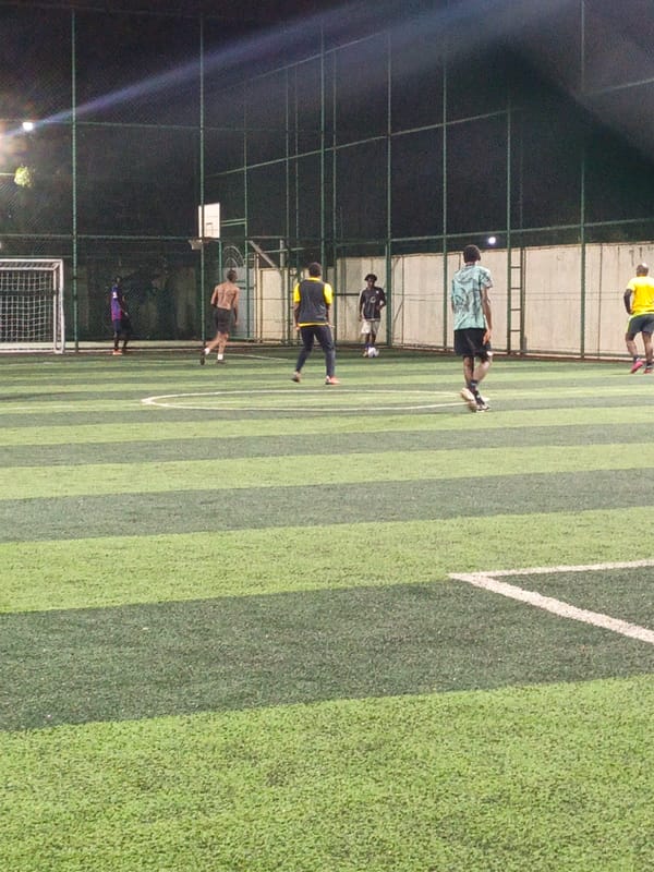 Evening soccer match played on artificial turf in Nairobi