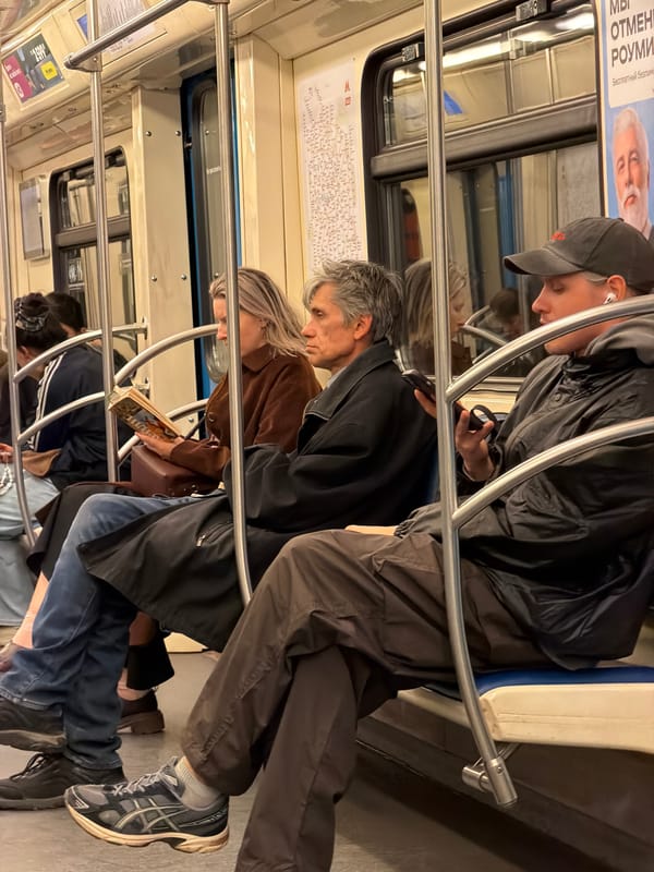 Evening commuters ride Moscow Metro in casual attire