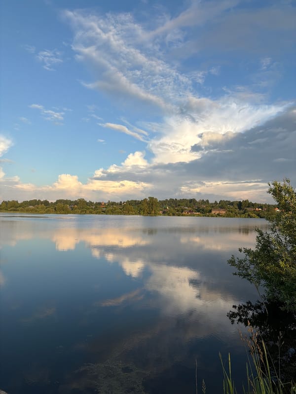 Sunset lakeside scene documented in Большая Уса, Russia
