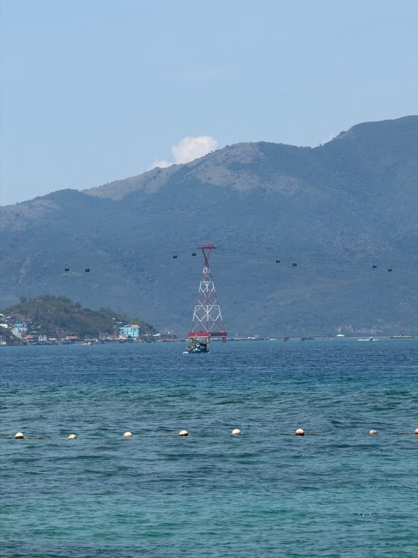 Tourist captures coastal scenes during early morning Nha Trang visit