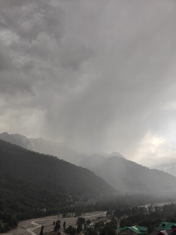 Storm clouds gather over mountain town Vashisht, India