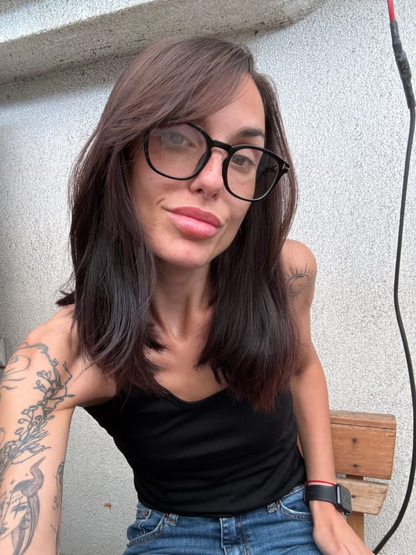 Woman Takes Selfie on Outdoor Balcony in Pleven