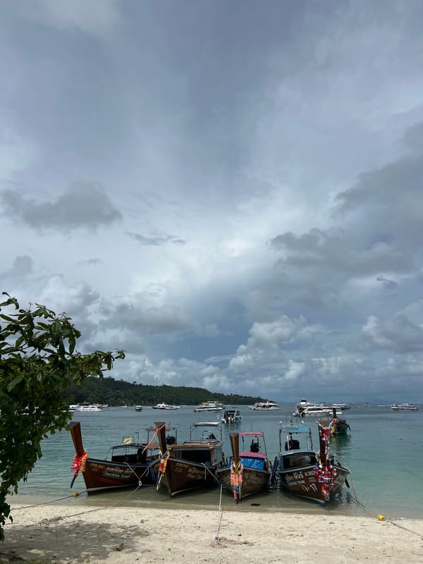 Morning beach life unfolds in Ao Nang, Thailand