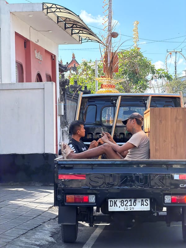 Morning street life and errands across Mengwi, Bali