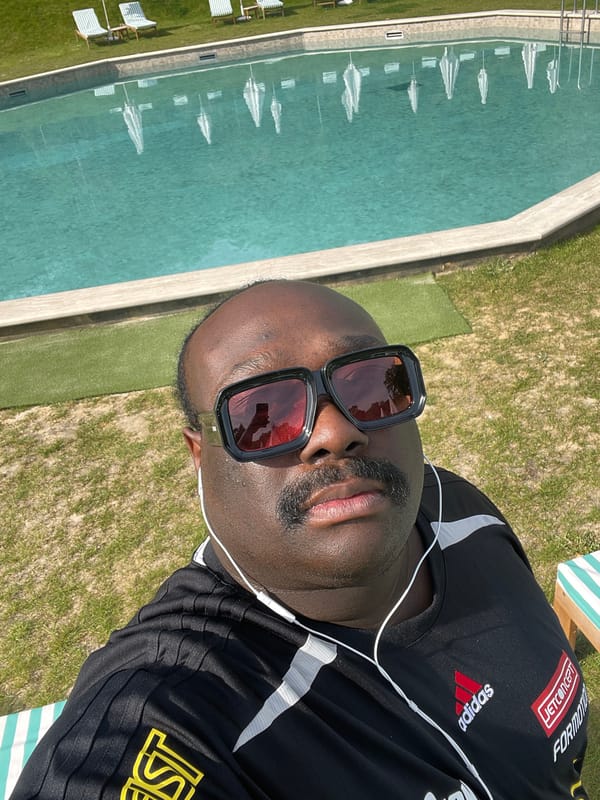 Man relaxes poolside during sunny morning in Auffargis, France
