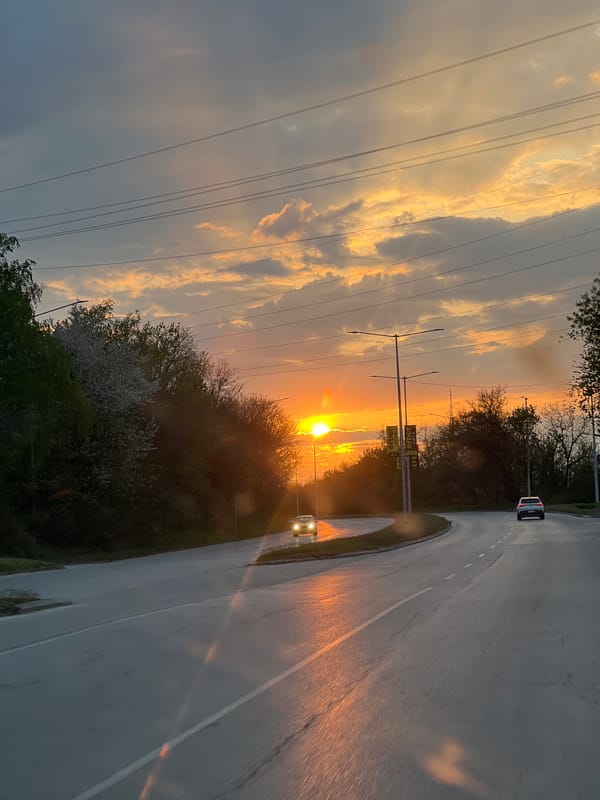 Evening traffic captured on curved road in Pleven, Bulgaria