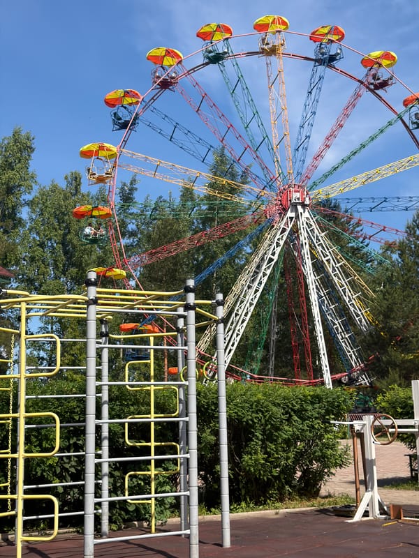 Morning scenes captured at Chaikovsky park with Ferris wheel