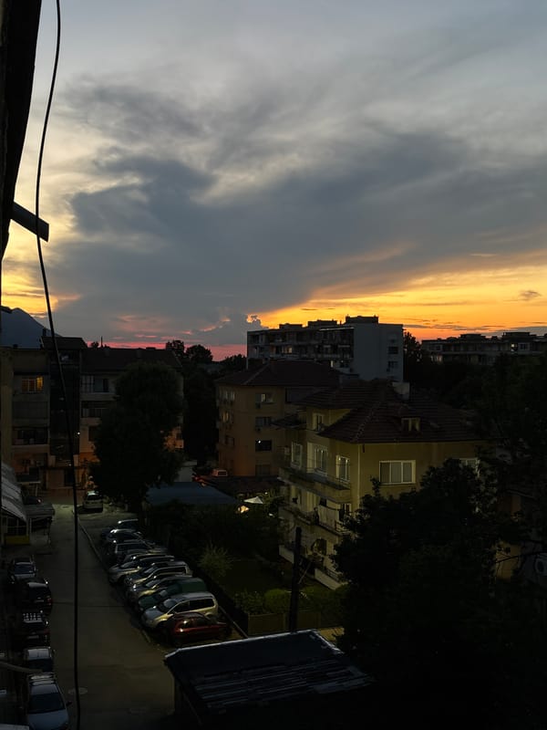 Sunset over Vratsa, with a chihuahua and a cider nearby
