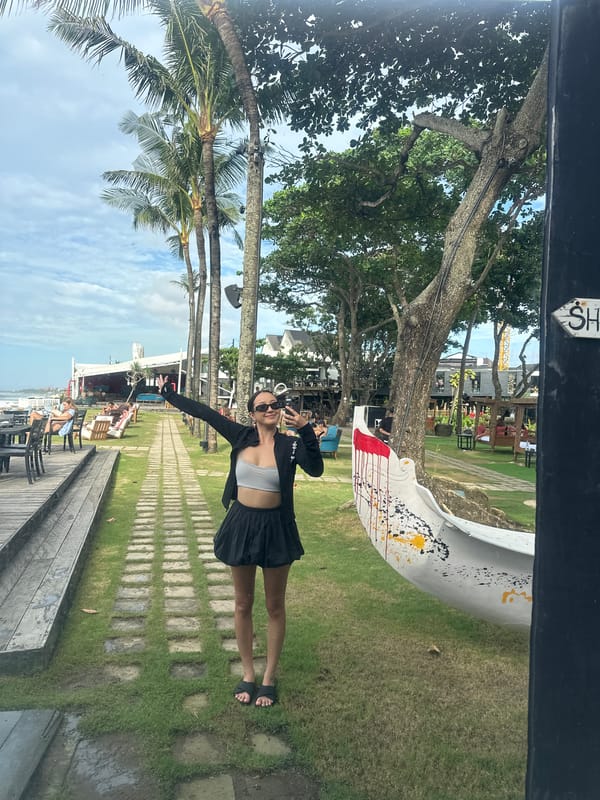Tourist captures morning beach cafe experience in North Kuta