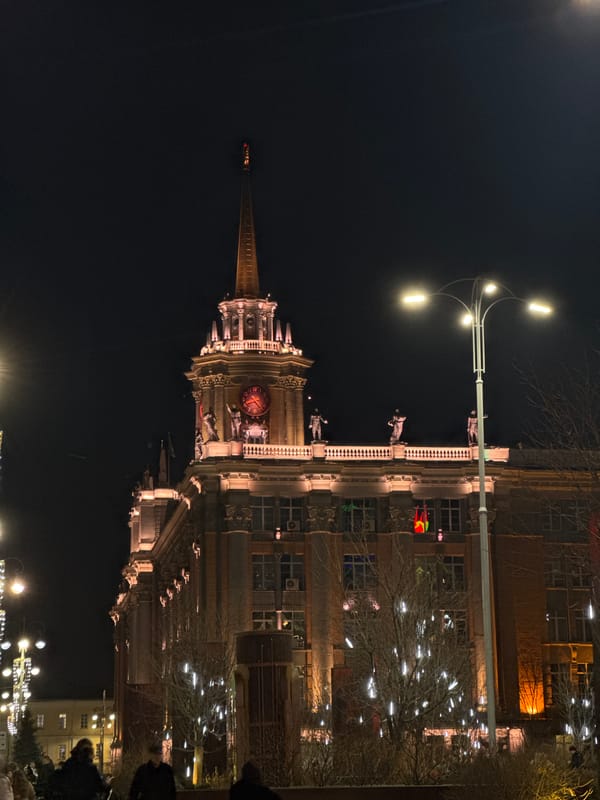 City exploration captures bronze statues, illuminated streets, sunset views