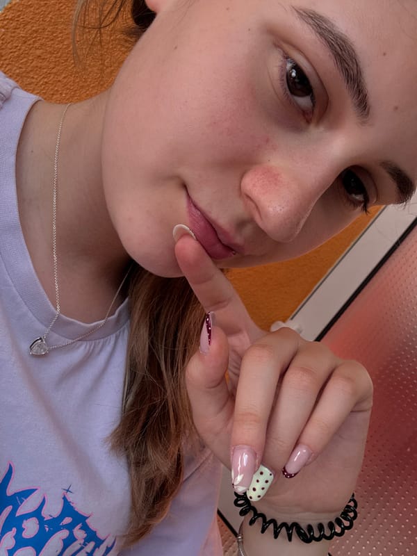 Student documents biology study session with selfies and cherries
