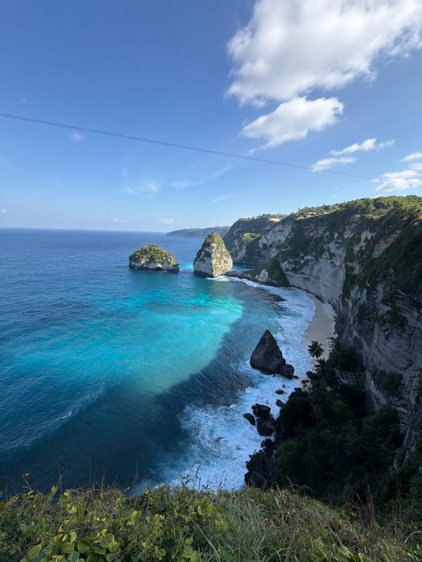Tourist documents scenic coastal visit in Nusa Penida