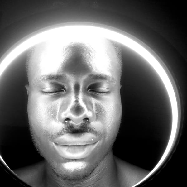 Portrait session captured in dramatic lighting in Narayi, Nigeria