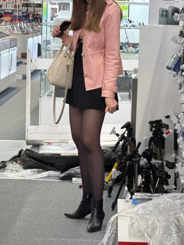 Woman shops for photography equipment in Sofia store