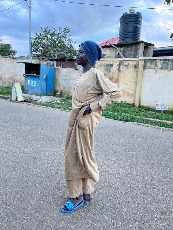 Everyday street life on a Jos, Nigeria urban road