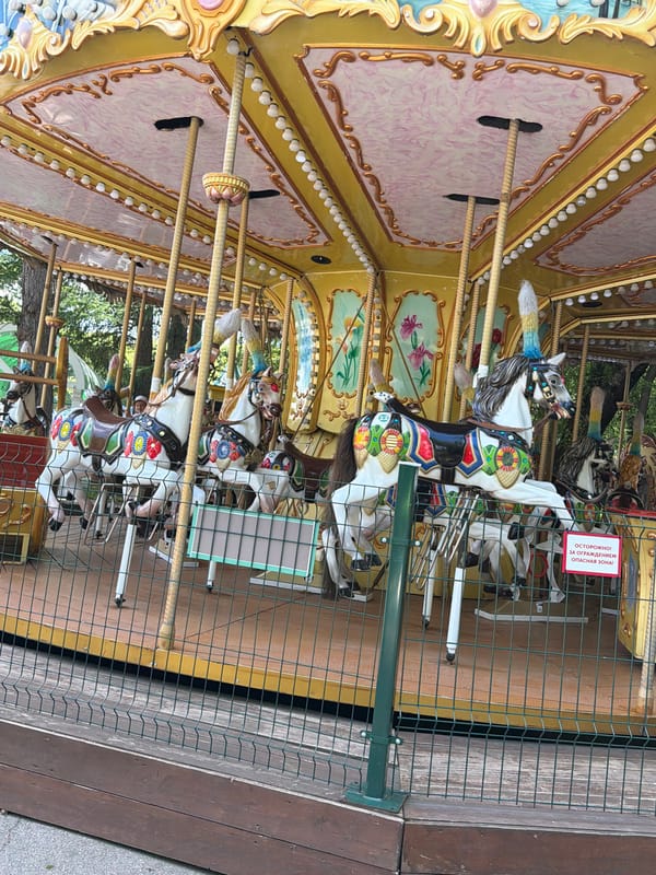 Amusement park in full swing on a summer morning in Perm