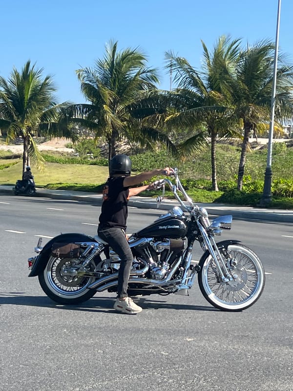 Motorcycle group rides through Cam Ranh Vietnam streets