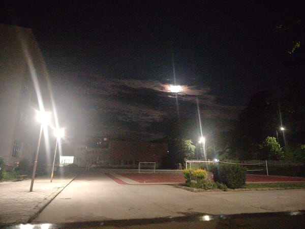 Gabrovo after dark: parks, roads, and a hazy moon