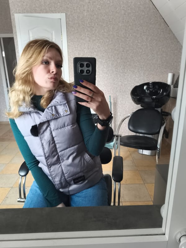 Woman takes mirror selfie in Russian town
