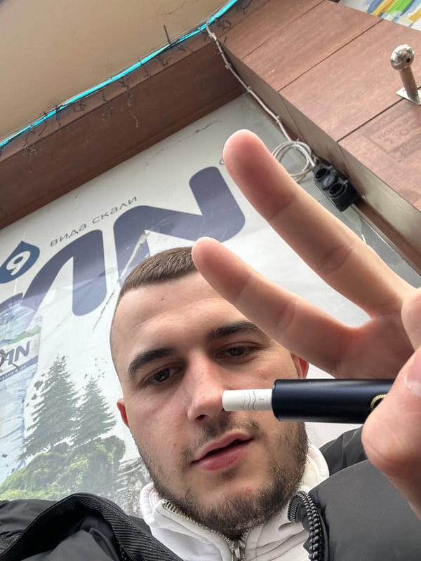 Outdoor cafe gathering documented in Plovdiv with vaping activity