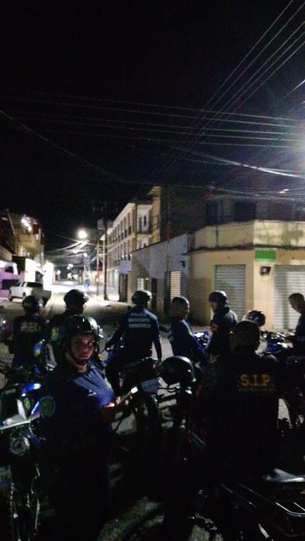 Police patrol streets of Tinaquillo, Venezuela at night