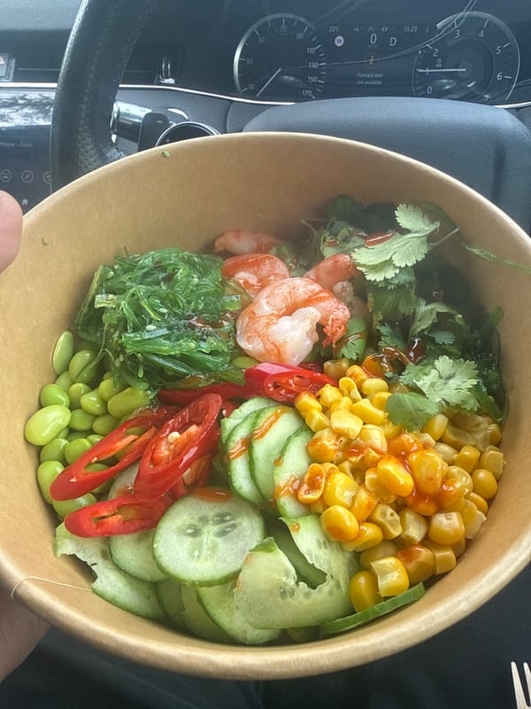 Takeaway meal with shrimp photographed in car in Cyprus