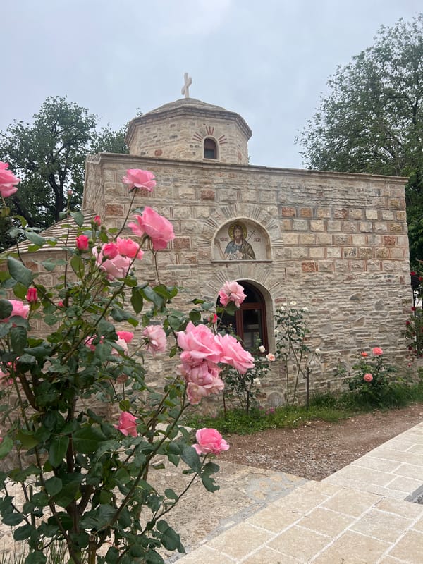 Stone church with rose garden documented in Budva, Montenegro