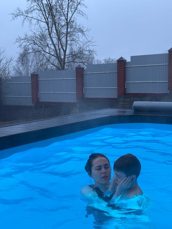 Family pool party and meal gathering documented in Perm
