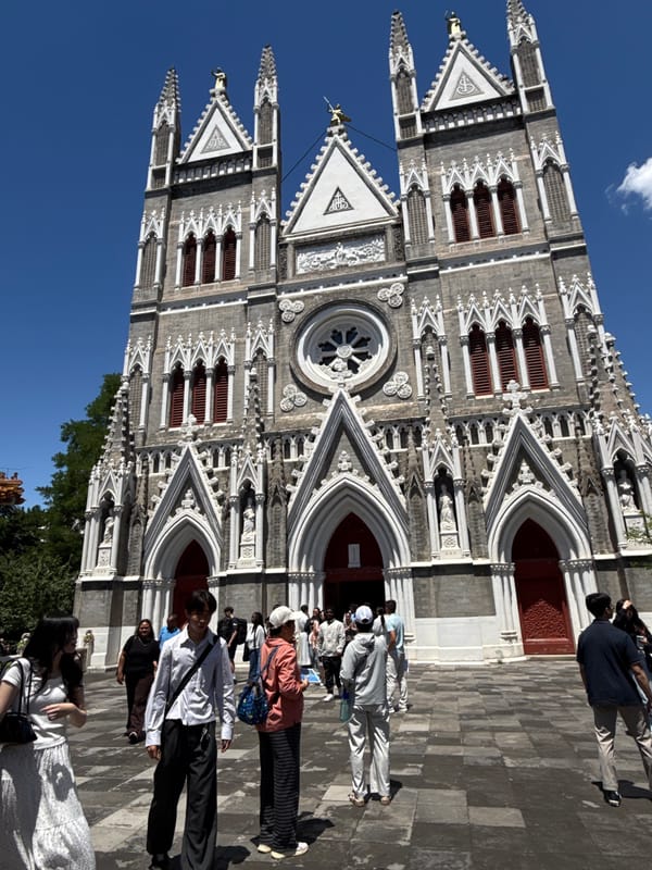 Visitors gather at historic Xishiku Church in Beijing