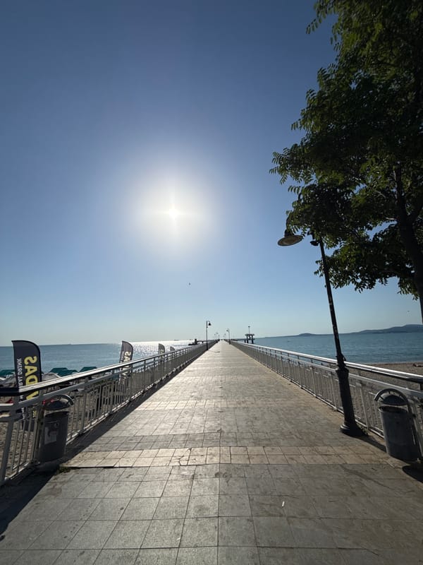 Burgas seafront: pier, beach, and the fisherman statue