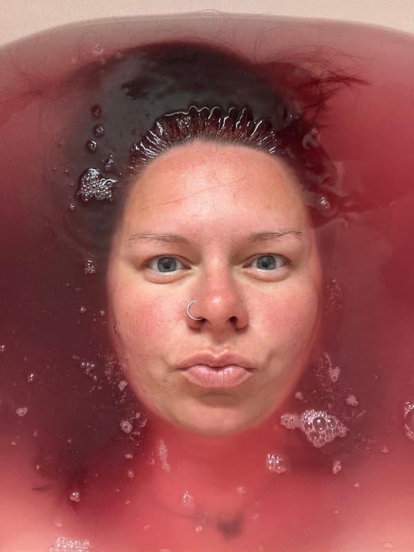 Person Takes Colorful Bath in Chaikovsky, Russia