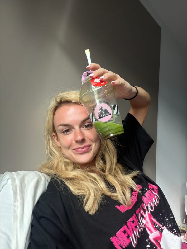 Woman photographed with plastic bottle in London