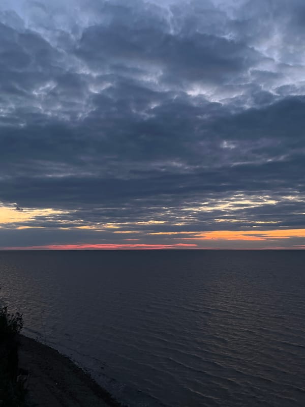 Sunset observed over water near Molchanovka, Russia