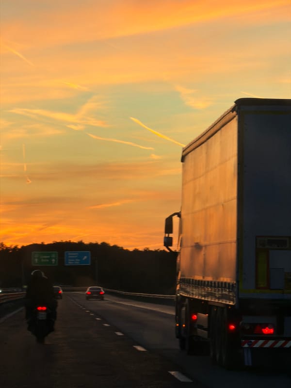 Highway traffic observed during sunset near Baliovtsi, Bulgaria