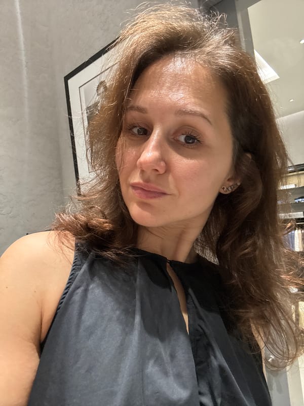 Woman takes selfies at Dubai retail location