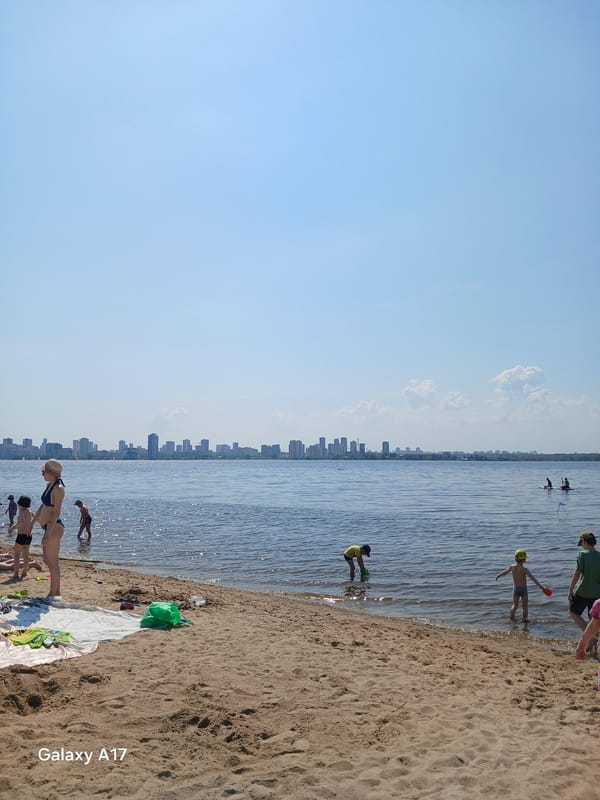 Early morning beachgoers gather at Yekaterinburg waterfront