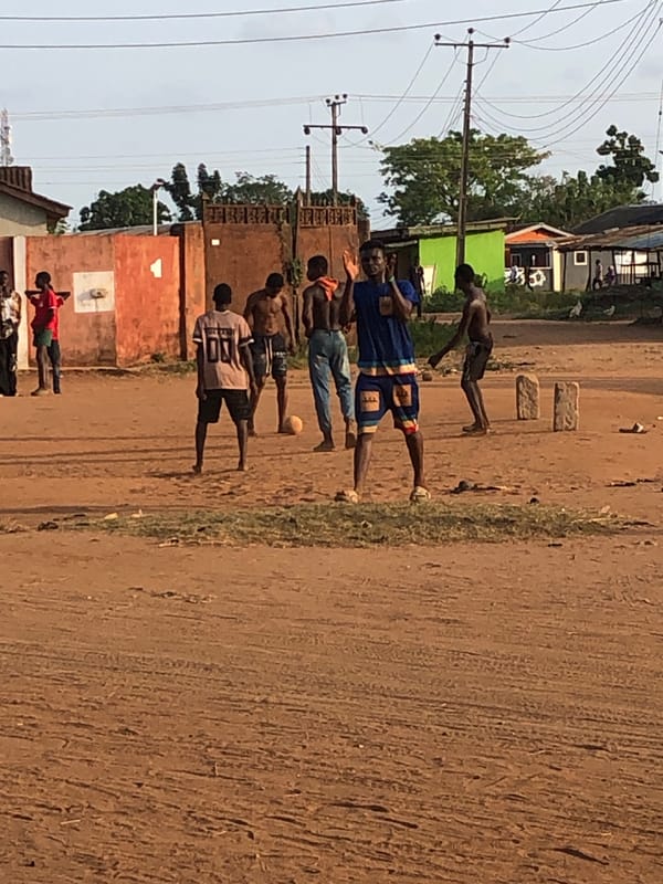 Daily street life documented in unidentified urban area
