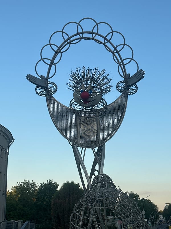 Golden hour illuminates Minsk landmarks and sculptures