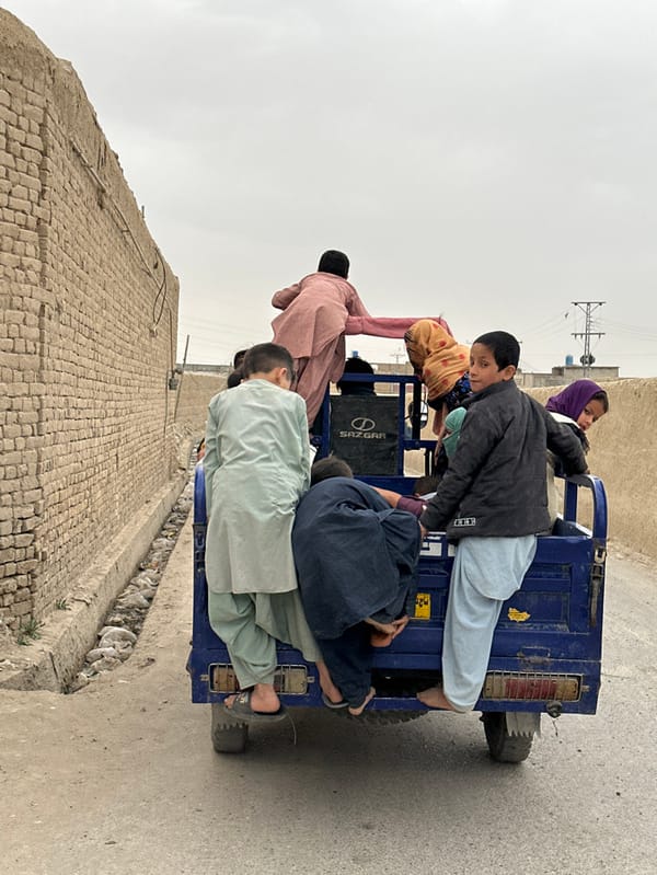Children gather on Quetta streets under overcast skies